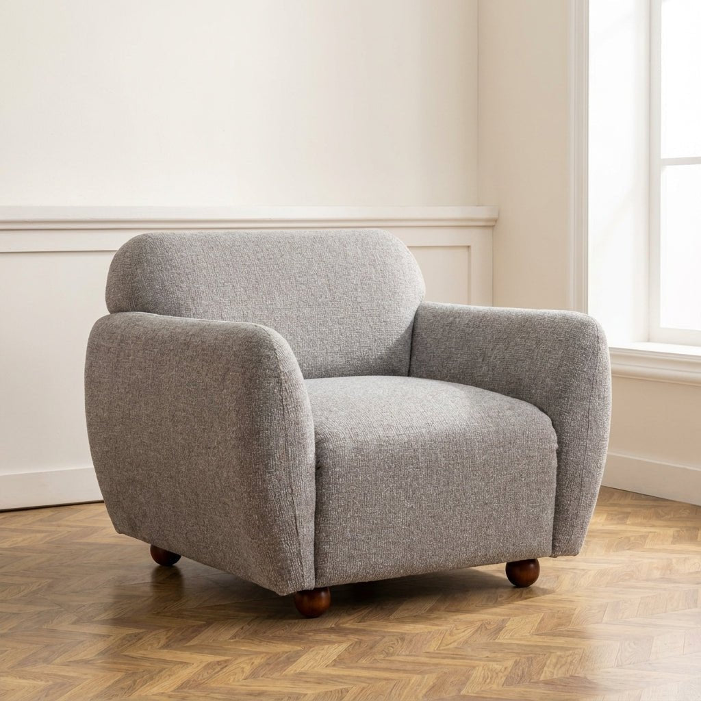 Poltrona Eddy Light Grey foto suggestiva in un interno moderno