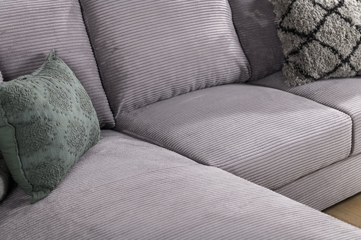 Divano Cambridge DH Interno in tessuto grigio a costine Dettaglio fotografico atmosferico