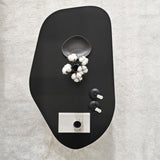 Tavolino Rock ovale nero 100 x 60 cm Legno composito rivestito in melammina