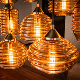 Lampada a sospensione Mali a 15 luci in vetro rigato color ambra