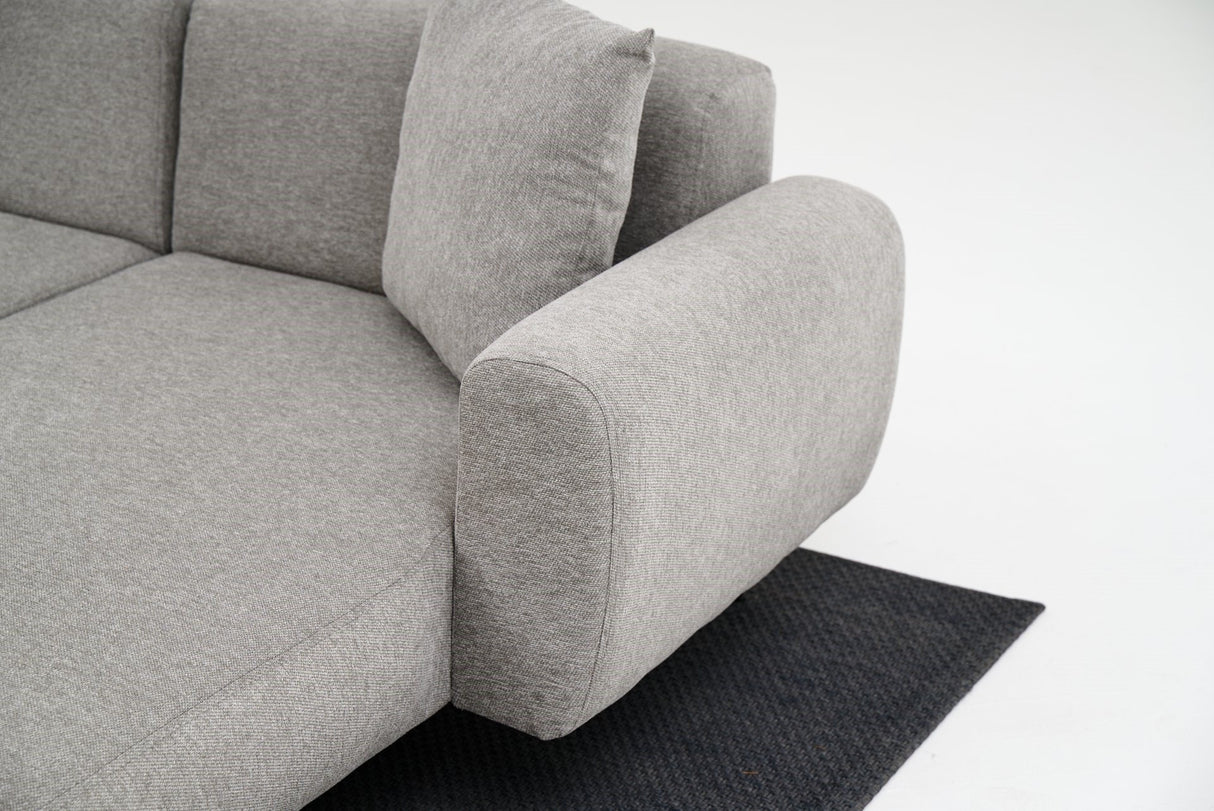 Divano angolare in tessuto grigio - Gambe alte e sottili - Interno solido - 252 x 155 cm - Laterale