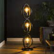 Lampada da terra Otan DH Interior Carbone LxPxH 128x45x36 Metallo Foto atmosferica vista frontale diagonale