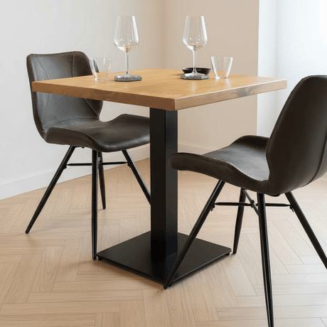 Tavolo da bistrot Legno di mango Foto suggestiva quadrata in un interno moderno