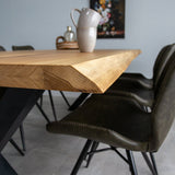 Eettafels - Eettafel Revi Eikenhout - Boomstamvorm - Zwarte X - poot - Dimehouse