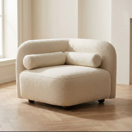 Poltrona Victoria Crème bouclé foto suggestiva in un interno moderno
