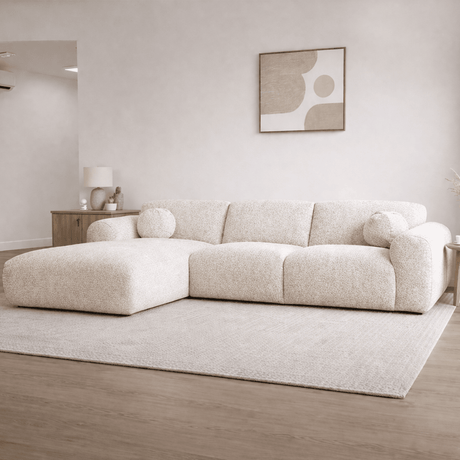 Divano angolare in tessuto bouclé beige - 292x169 cm - Shane - sinistra
