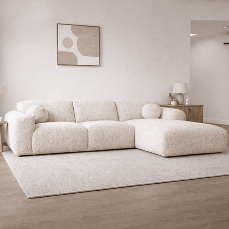 Divano angolare in tessuto bouclé beige - 292x169 cm - Shane - destra