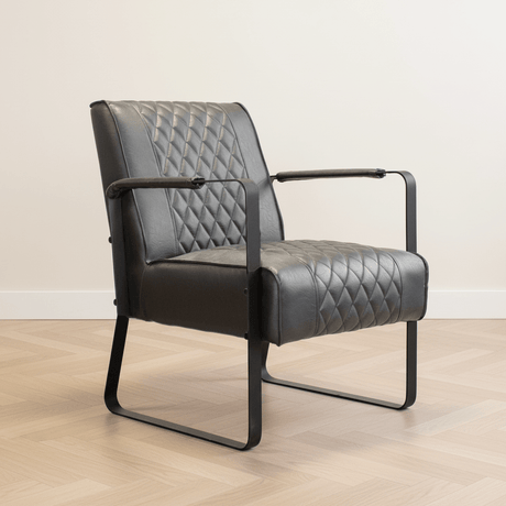 Poltrona industriale Peter foto atmosferica antracite in un interno moderno