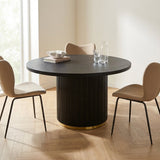 Tavolo da pranzo rotondo Nero Elora Legno di mango con foto atmosferica Golden Detail in interni moderni