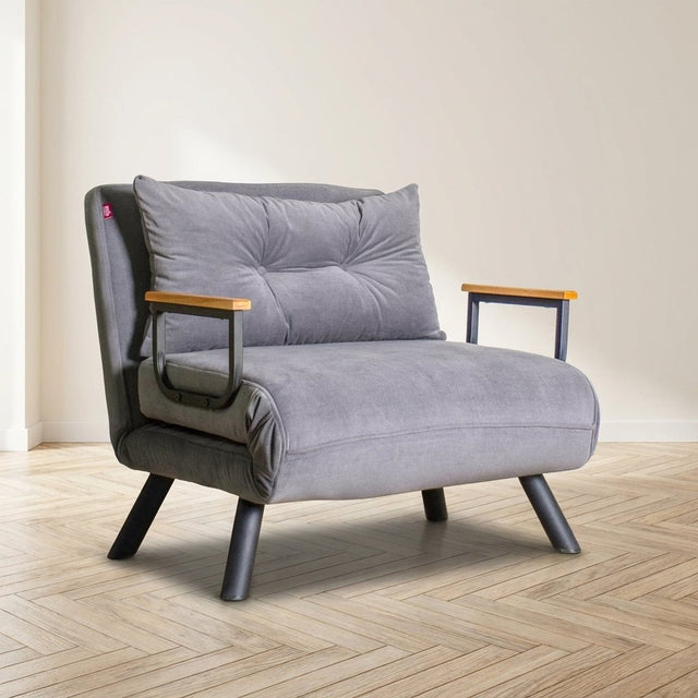 Poltrona letto Sando Tessuto Grigio foto atmosferica in un interno moderno