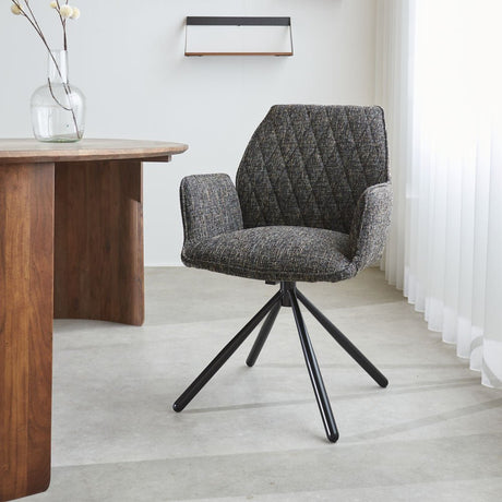 Sedia per sala da pranzo Novan in ciniglia Dimehouse Nero LxPxH 71x64x56 Tessuto Foto atmosferica vista frontale diagonale