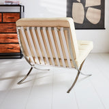 Esposizione di poltrone Dimehouse Crema LxPxH 80x78x78 Pelle di vacchetta Foto suggestiva vista diagonale dal retro