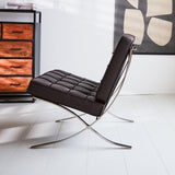 Esposizione di poltrone Dimehouse Marrone LxWxH 80x78x78 Pelle di vacchetta Vista laterale della foto atmosferica