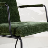 Poltroncina Hailey in ciniglia Dimehouse Tessuto verde scuro LxLxH 66x64x37 Dettaglio fotografico atmosferico