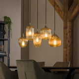 Lampada a sospensione Ella DH Interni Vetro color ambra LxPxH 127x48x27 Vetro color ambra Foto atmosferica vista frontale diagonale