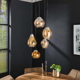 Lampada a sospensione Felien Amber DH Interno Vetro color ambra LxLxH 59x59x32 Vetro Foto atmosferica vista frontale diagonale