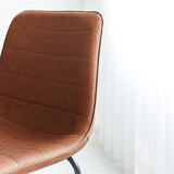 Sgabello da bar Mark Ecopelle Dimehouse Cognac LxLxH 79x65x54 Ecopelle Dettaglio fotografico atmosferico