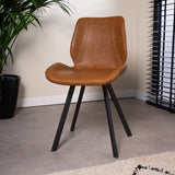 Sedia per sala da pranzo Barry Dimehouse Cognac LxPxH 69x66x48 Ecopelle Foto atmosferica vista diagonale frontale