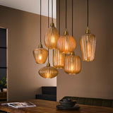 Lampada a sospensione Olaf DH Interni Vetro color ambra LxPxH 96x47x46 Vetro color ambra Foto atmosferica vista frontale diagonale