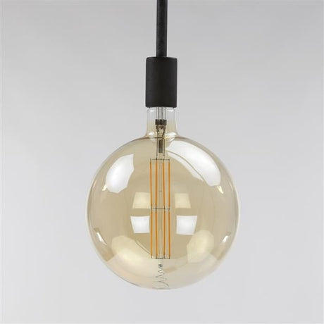 Sorgente luminosa Sfera filamento LED Ø20 DH Interno Vetro color ambra LxPxH 32x23x23 Vetro color ambra Foto atmosferica vista frontale diagonale