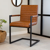 Sedia per sala da pranzo Kuba Dimehouse Cognac LxPxH 71x59x58 Ecopelle Foto atmosferica diagonale vista frontale