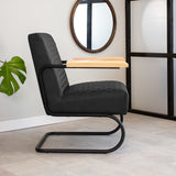 Poltrona Lars Dimehouse Nero LxPxH 68x64x39 Ecopelle Foto atmosferica vista laterale