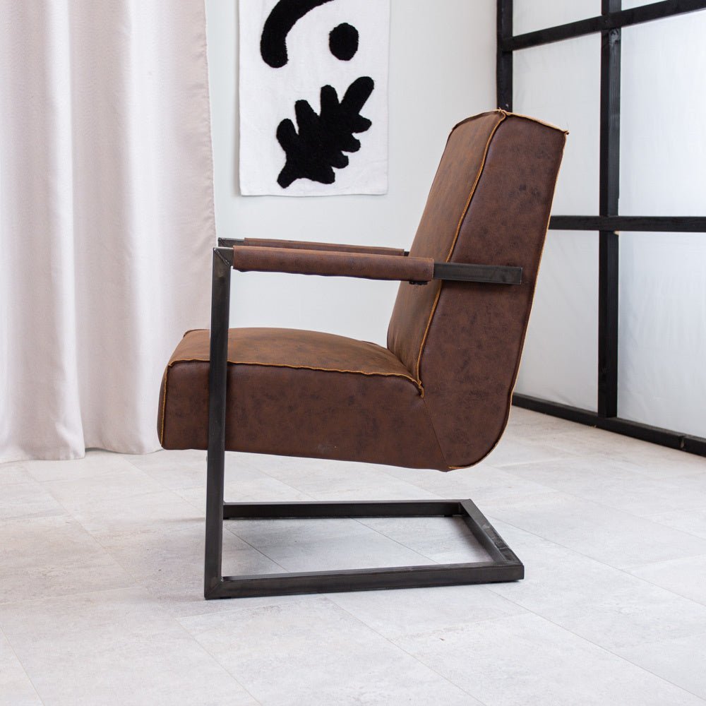 Poltrona Tigre Dimehouse Marrone LxPxH 69x58x41 Ecopelle Foto atmosferica vista laterale